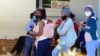 People queue to be tested for COVID-19 at the Livingstone Hospital in Port Elizabeth, South Africa, Nov. 13, 2020.