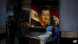 Foto Presiden Suriah Bashar Assad di Damaskus, ibukota Suriah.