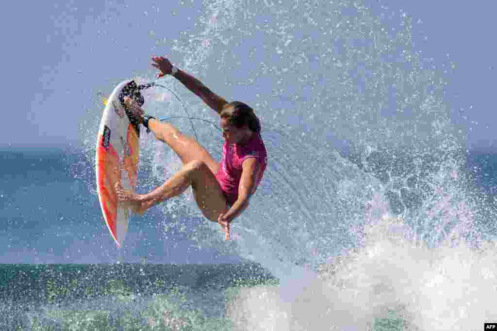 Courtney Conlogue of the U.S. performs a manuvre on a wave one day before the start of the World Surf League women&#39;s championship tour surfing event at Keramas in Gianyar on Indonesia&#39;s resort island of Bali.