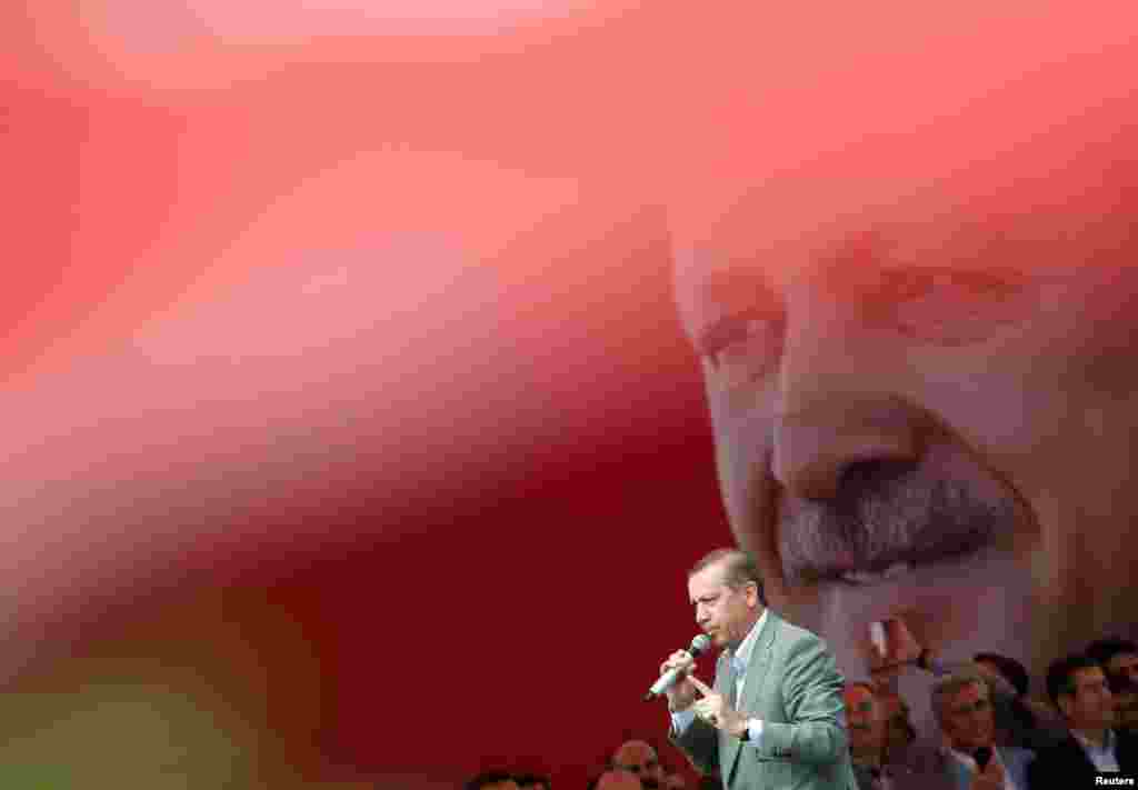 Turkey's Prime Minister Tayyip Erdogan speaks during a rally in Sincan, June 15, 2013. Erdogan warned protesters occupying a central Istanbul park that they should leave before a ruling party rally on Sunday or face eviction by the security forces.
