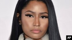 FILE - Singer Nicki Minaj attends the Tidal X: 1015 benefit concert, hosted by Tidal and the Robin Hood Foundation, at the Barclays Center in New York. 