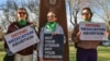 FILE - Members of the Women's March group protest in support of access to abortion medication outside the Federal Courthouse on March 15, 2023, in Amarillo, Texas.