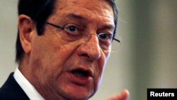 Cyprus' President Nicos Anastasiades addresses a conference of civil servants in Nicosia, March 29, 2013. 