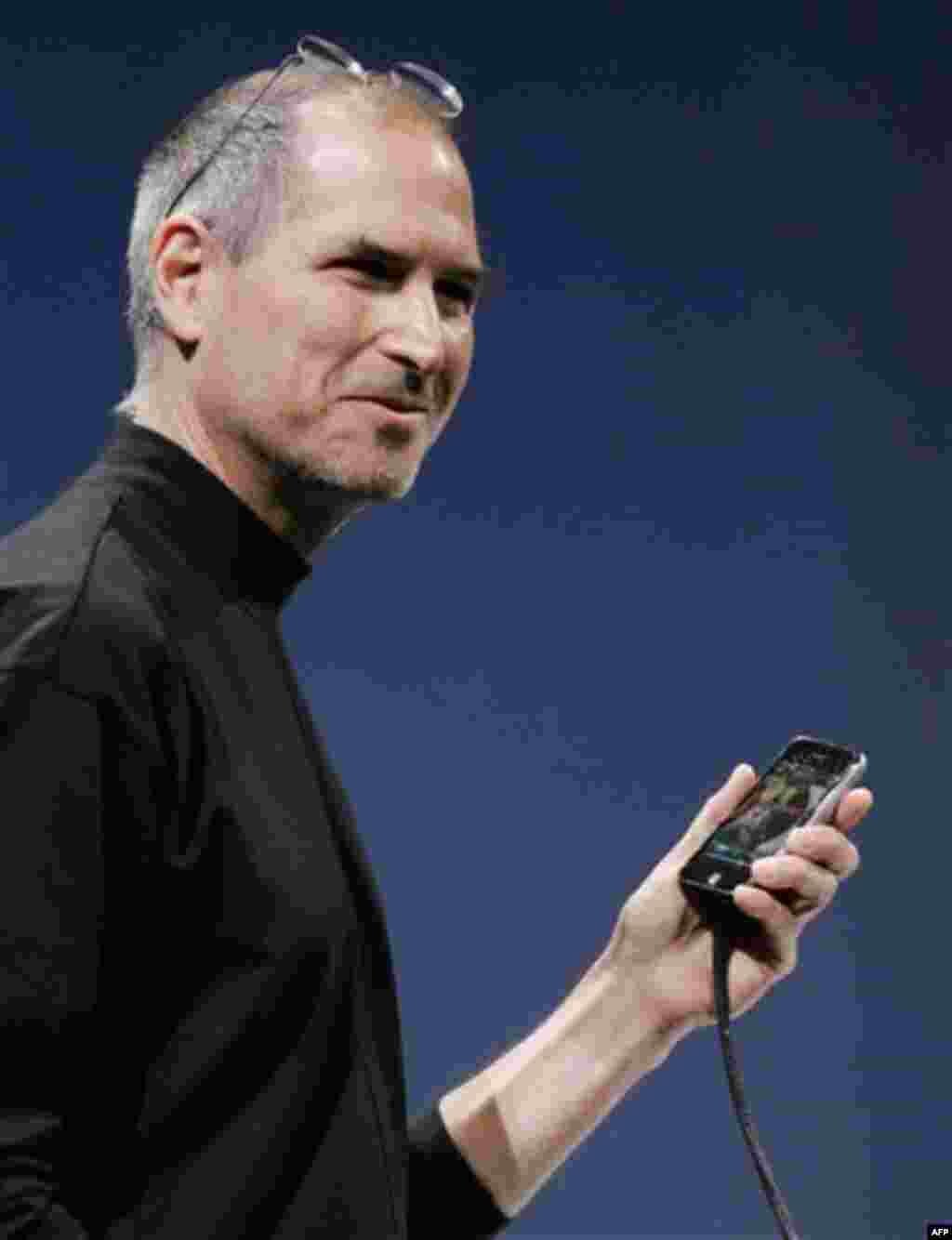 **FILE**Apple CEO Steve Jobs demonstrates the new iPhone during his keynote address at MacWorld Conference & Expo in San Francisco, in this Jan. 9, 2007 file photo. The hype around Apple Inc.'s upcoming iPhone is abundantly clear. But how the iPhone will 