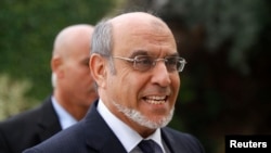 Then-Tunisian PM Hamadi Jebali arriving for a round of consultations with other political parties at the Carthage Palace in Tunis, 2.15.2013