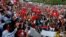 Supporters of Tunisian President Kais Saied rally in support of his seizure of power and suspension of parliament, in Tunis, Oct. 3, 2021.