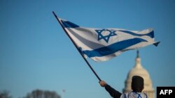 FILE —Demonstrators in support of Israel gather to denounce antisemitism and call for the release of Israeli hostages on the National Mall in Washington, DC, on November 14, 2023.