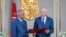 Tunisian President Kais Saied (L) meets with Prime Minister-designate Habib Jemli in Tunis, Tunisia, in this handout picture obtained by Reuters from the Tunisian Presidency, Nov. 15, 2019.