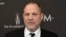 FILE - Harvey Weinstein arrives at The Weinstein Company and Netflix Golden Globes afterparty in Beverly Hills, California, Jan. 8, 2017.