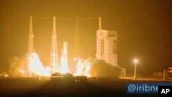 In this image taken from video an Iranian rocket carrying a satellite is launched from Imam Khomeini Spaceport in Iran’s Semnan province, some 230 kilometers (145 miles) southeast of Iran’s capital, Tehran, Feb. 9, 2020.