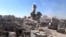 This image shows shelling in the Barzeh area of Damascus, Syria, Sept. 17, 2013. 