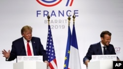 美國總統特朗普和法國總統埃馬克龍出席在法國西南部比亞里茨舉行的G7峰會聯合新聞發布會。 (2019年8月26日)