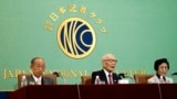 From left, Jiro Hamasumi, Terumi Tanaka and Michiko Kodama, members of the Japan Confederation of A- and H-Bomb Sufferers Organizations, attend a press conference at Japan National Press Club Tuesday, Dec. 24, 2024, in Tokyo. (AP Photo/Eugene Hoshiko)