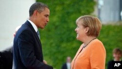 Le président Obama et la chancelière allemande Angela Merkel à Berlin