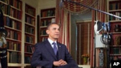 US President Barack Obama records the weekly address