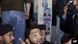 The alleged killer of Governor of Punjab, Salman Taseer, being brought to a court in Islamabad, Pakistan, Jan 05, 2011