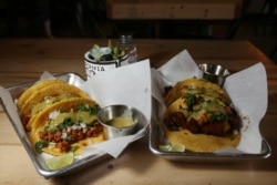 In this Friday, October 18, 2019 photo is two of the taco selections at the Earth Plant Based Cuisine restaurant in Phoenix.