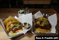 In this Friday, October 18, 2019 photo is two of the taco selections at the Earth Plant Based Cuisine restaurant in Phoenix.