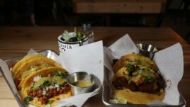 In this Friday, October 18, 2019 photo is two of the taco selections at the Earth Plant Based Cuisine restaurant in Phoenix.