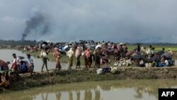 နရေပ်စွန့်ခွာ ထွက်ပြေးလာကြ Rohingya များ (၂၀၀၇)(ဓာတ်ပုံ- AFP)