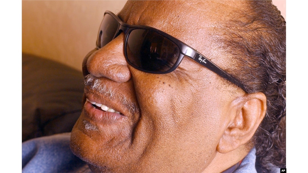 FILE - Clarence Fountain smiles during an interview before the start of the band's show at the Fillmore in San Francisco, Jan. 11, 2002.