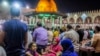 Young Muslim girls cut out from the prayers, which lasted for nearly four hours in Amru Ebn Alaas mosque in old Cairo, Egypt, June 21, 2017. (Hamada Elrasam/VOA)