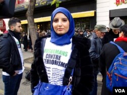 Sfia Zraa, 18, travelled from Brussels to join the Paris march, Nov. 11, 2017. (L. Bryant / VOA)