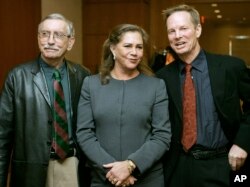 FILE - Playwright Edward Albee, left, appears with actress Kathleen Turner and actor Bill Irwin moments before a news conference, in Boston, Jan. 4, 2005, held to answer questions about their upcoming production of Albee's play "Who's Afraid of Virginia Woolf?"