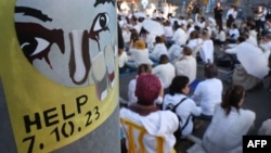 Relatives and supporters of Israelis held hostage in Gaza attend a sit-in demanding an immediate agreement for the return of all abductees on the hostage square in front of the Israeli Defense Ministry in Tel Aviv, on Dec. 25, 2024.