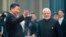 FILE - Chinese President Xi Jinping, left, welcomes Indian Prime Minister Narendra Modi for a meeting at a Shanghai Cooperation Organization summit in Qingdao in eastern China's Shandong province, June 10, 2018. 