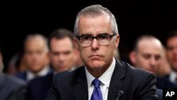 FILE - The FBI's Andrew McCabe appears before a Senate Intelligence Committee hearing on Capitol Hill in Washington, June 7, 2017. McCabe has been buffeted by attacks from President Donald Trump and his Republican allies over alleged anti-Trump bias in the agency.