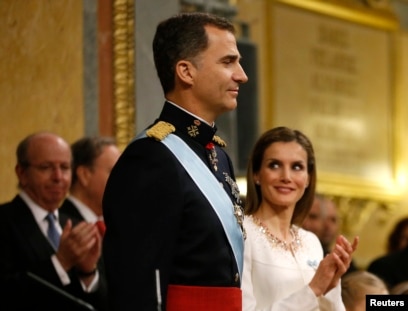 King Felipe VI of Spain appearing at the balcony of the Royal
