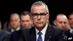 FILE - Acting FBI Director Andrew McCabe appears before a Senate Intelligence Committee hearing about the Foreign Intelligence Surveillance Act, on Capitol Hill in Washington, June 7, 2017. McCabe has been buffeted by attacks from President Donald Trump and his Republican allies over alleged anti-Trump bias in the agency.