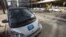 FILE - A line of Car2Go vehicles takes up a block of parking in downtown Calgary, Alberta, May 13, 2015. 