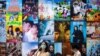 Visitors walk past a display of posters for Chinese movie and television productions at the China International Fair for Trade in Services in Beijing, Sept. 3, 2021. 