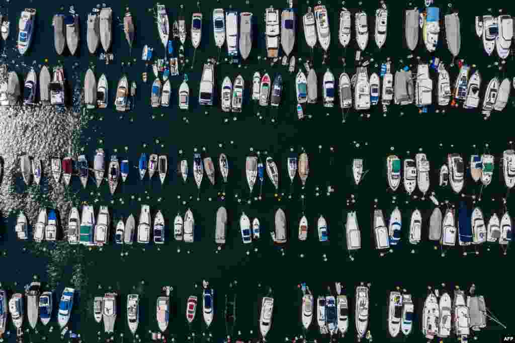 An aerial view shows boats moored in Aberdeen Harbor in Hong Kong.