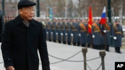 FILE - Vietnamese Communist Party General Secretary Nguyen Phu Trong attends a wreath-laying ceremony at the Tomb of the Unknown Soldier in Moscow, Nov. 24, 2014.