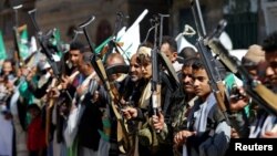 Houthi supporters attend a gathering ahead of the birth anniversary of the Prophet Mohammed in Sanaa, Yemen, Nov. 28, 2017.