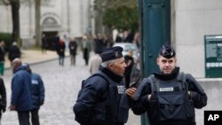 France Remains on High Alert, Lays Dead to Rest