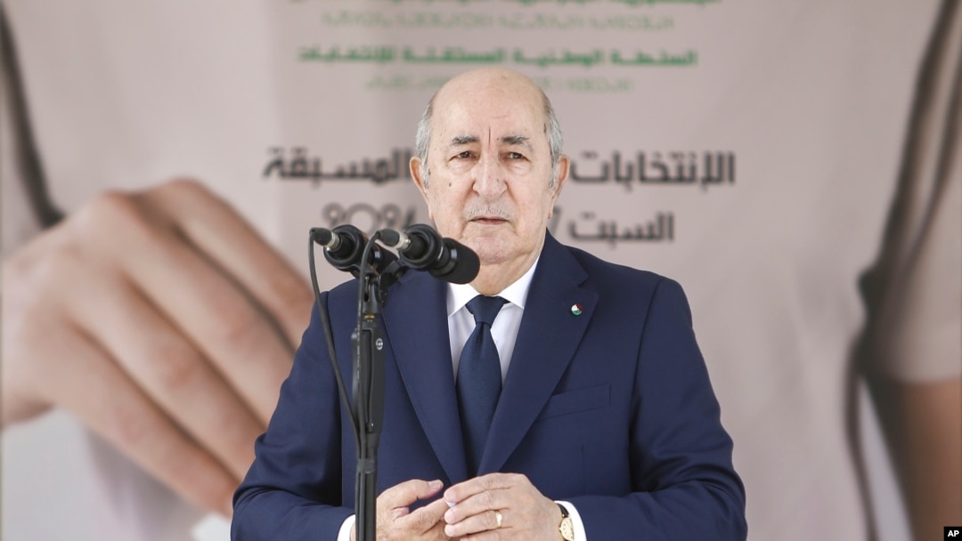 FILE - Algerian president Abdelmajid Tebboune speaks after casting his ballot inside a polling station during the presidential elections, Sept. 7, 2024, in Algiers, Algeria. 