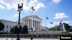 Здание Верховного суда США в Вашингтоне. 24 июня 2024 года. (REUTERS/Nathan Howard).
