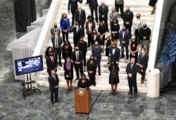 FILE - Assembly Majority Leader Crystal D. Peoples-Stokes, D-Buffalo, speaks in favor of new legislation for police reform while standing with assembly members during a news briefing at the Capitol, June 8, 2020, in Albany, N.Y.