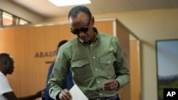 FILE - Rwanda's President Paul Kagame casts his vote in a presidential election, in Kigali, July 15, 2024.