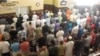 FILE - Men gather for prayer on the first day of Ramadan at the Dar Al-Hijrah Islamic Center in Falls Church, Virginia, in 2013. (VOA/J. Taboh) 