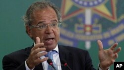 FILE - Brazil's Economy Minister Paulo Guedes speaks during a ceremony where the country's government bank presidents are to be presented at Planalto presidential palace in Brasilia, Jan. 7, 2019. 