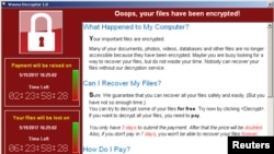 受到”想哭“（WannaCry）勒索软件攻击的电脑的屏幕显示