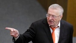 FILE - In this March 11, 2020, photo, Russian Liberal Democratic Party leader Vladimir Zhirinovsky speaks during a session at the State Duma, the lower house of the Russian Parliament, in Moscow, Russia. Zhirinovsky, the nationalistic leader of the Liberal Democratic Party of Russia, suggested that the U.S. and its greedy pharmaceutical companies were to blame for the coronavirus.