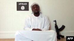 FILE - Amedy Coulibaly, shown in a video, also was a Muslim from Mali.