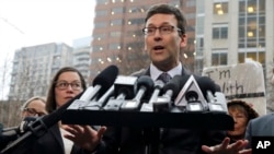 Washington Attorney General Bob Ferguson talks to reporters Friday, Feb. 3, 2017, following a hearing in federal court in Seattle. A U.S. judge on Friday temporarily blocked President Donald Trump's ban on people from seven predominantly Muslim countries.