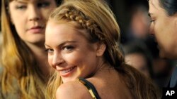 Lindsay Lohan, a cast member in "Scary Movie V," turns back at the Los Angeles premiere of the film at the Cinerama Dome on April 11, 2013 in Los Angeles.